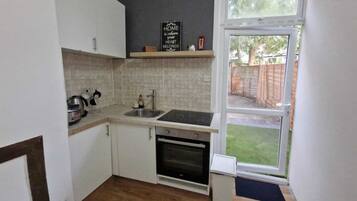 Apartment | Private kitchen | Fridge, microwave, oven, stovetop