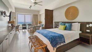 Departamento junior, 1 cama Queen size y sofá cama, vista al océano, junto a la playa | 1 habitación, ropa de cama de alta calidad y edredón 