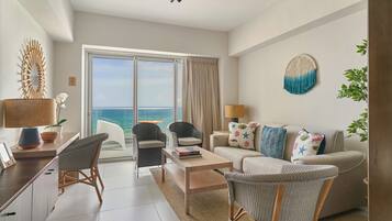 Junior Apartment, 1 Queen Bed with Sofa bed, Ocean View, Beachside | Living area | 43-inch Smart TV with digital channels, Netflix, streaming services