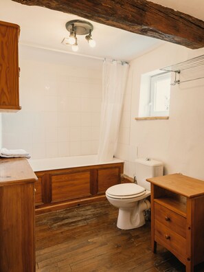 Shower, hair dryer, towels, toilet paper