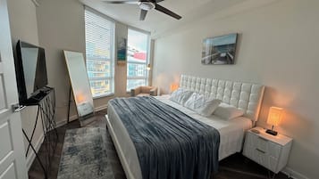 1 bedroom, desk, iron/ironing board, travel crib