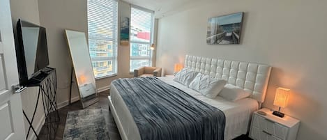 1 bedroom, desk, iron/ironing board, travel crib