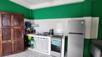 Fridge, blender, cookware/dishes/utensils, dining tables