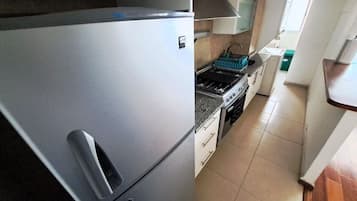 Apartment | Private kitchen | Full-size fridge, microwave, oven, toaster
