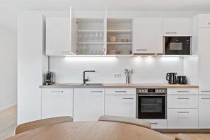 Apartment | Private kitchen | Fridge, microwave, oven, stovetop - Stylish 2BR Getaway in Bivange Roeser (Roeser)