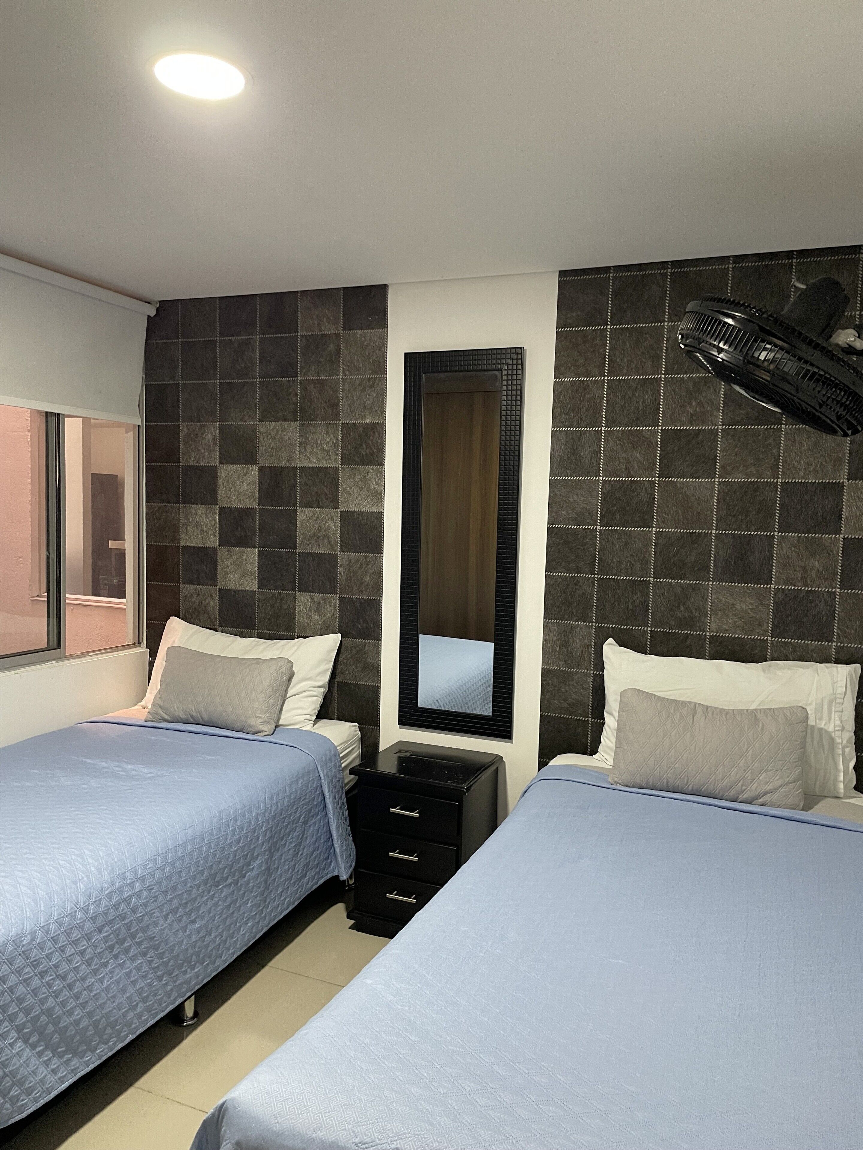 3 bedrooms, down duvets, minibar, laptop workspace