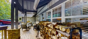 Dog-friendly home with private deck, outdoor fireplace, & immaculate interior