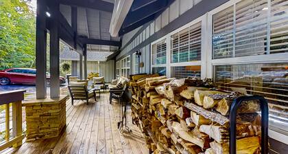 Dog-friendly home with private deck, outdoor fireplace, & immaculate interior