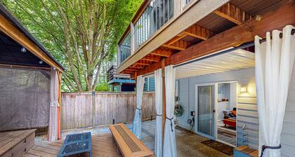 Modern lower-level getaway with a fireplace, inviting patio & washer/dryer