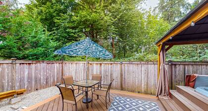 Modern lower-level getaway with a fireplace, inviting patio & washer/dryer