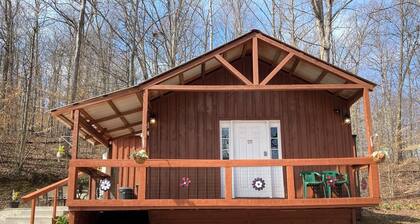 Happy Hills 🙂It’s a three bedroom one bath cabin with a side patio and garage