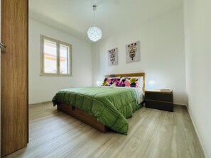 2 bedrooms, iron/ironing board, travel crib, bed sheets