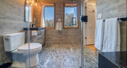 Duplex King Suite · Marble Jacuzzi · Gas Fireplace · Steam Shower · Sleeps 4