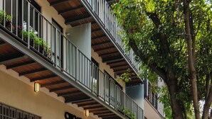 A building with a sign reading "Chopra 24". - Choapan 28 - Lux Apartments in Condesa (Mexico City)