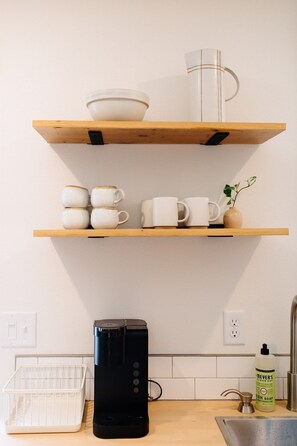 Fridge, microwave, coffee/tea maker, toaster
