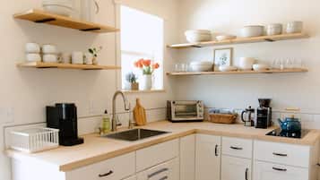 Fridge, microwave, coffee/tea maker, toaster