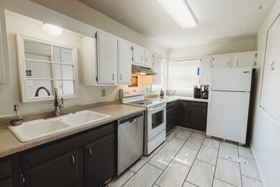 Centrally located 4Bedroom, 5 BEDs & 2Bath; Beautiful backyard