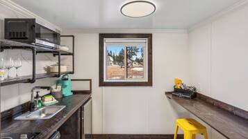 Fridge, microwave, stovetop, coffee/tea maker