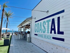 Outdoor dining - "Kays Coastal Getaway" | Palm Beach Resort A55 | Heated Outdoor Pool | My Beach Getaways (Orange Beach)