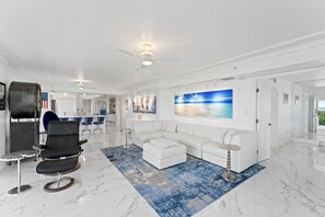 TV - Luxury Oceanfront Condo with Stunning Views & Modern Amenities (Cape Canaveral)