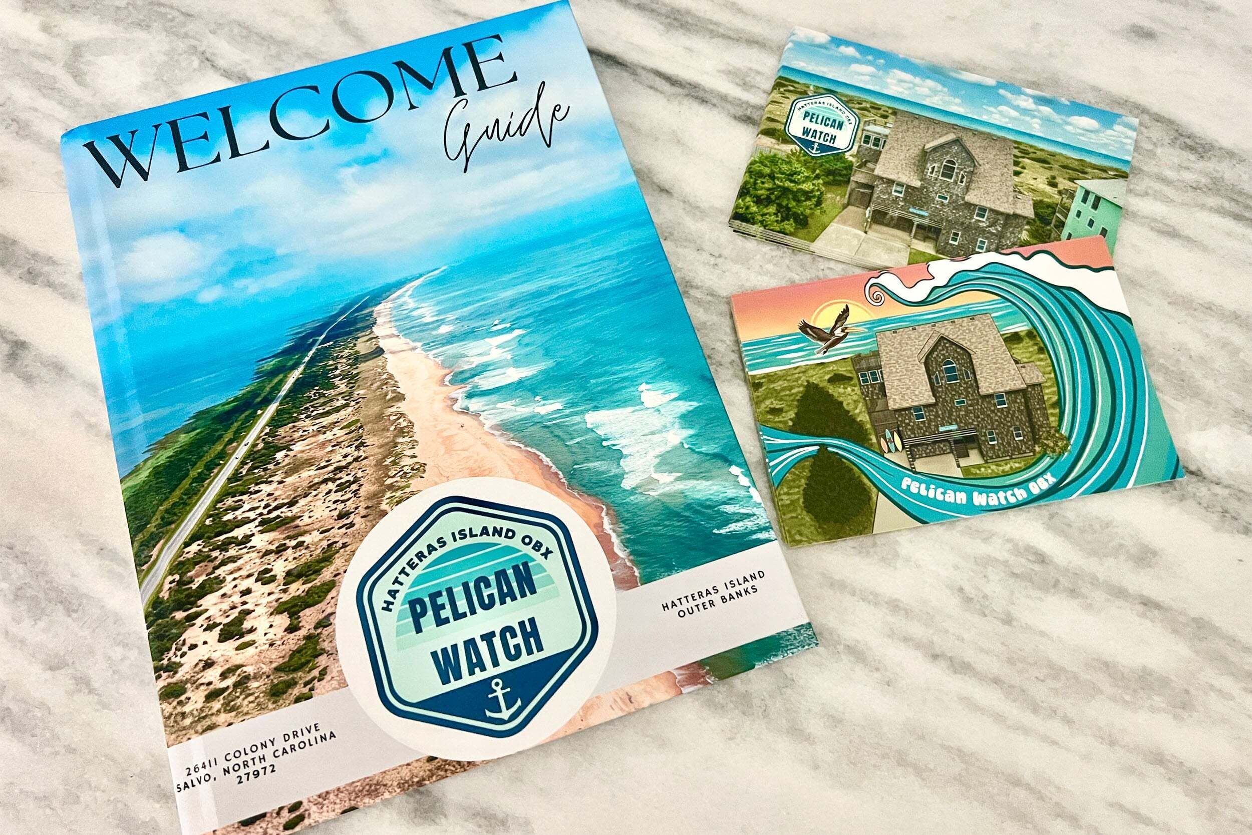 A welcome guide for Hatteras Island OBX Pelican Watch, including a scenic beach view and a house illustration.