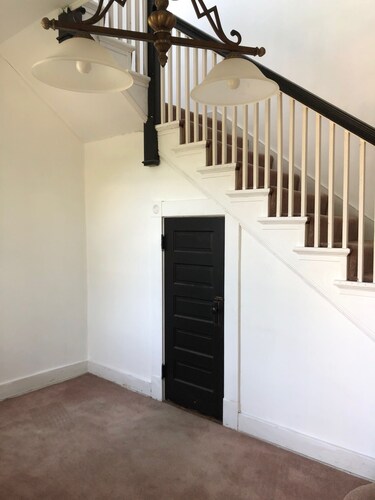 Relax in beautiful second floor apartment with balcony & private fenced yard.
