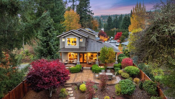 A two-story house with a patio and garden. - Poppyrosa Estate with mountain views minutes from Seattle, Bellevue, Sea-Tac (Issaquah)