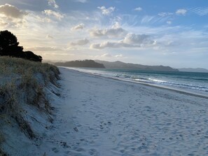 On the beach, white sand, beach towels - The Matarangi B & B (Matarangi)