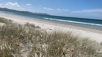 On the beach, white sand, beach towels