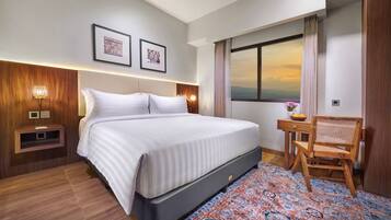 Deluxe | Premium bedding, in-room safe, desk, soundproofing