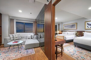 Family Suite | Área de estar | TV LED, smart speakers