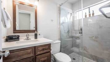 Hair dryer, towels, soap, shampoo