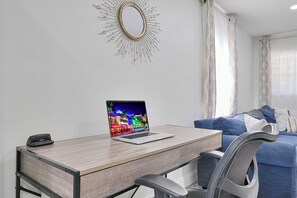 Comfort Apartment | Living area | 32-inch Smart TV with cable channels