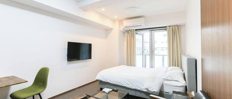 1 dormitorio, tabla de planchar con plancha, wifi y ropa de cama