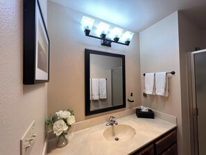 Bathtub, hair dryer, towels