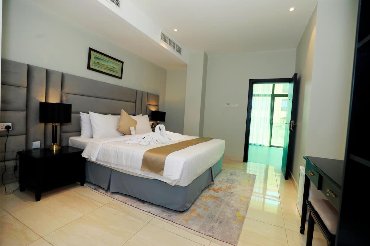 Luxury Suite | Premium bedding, individually furnished, desk, laptop workspace