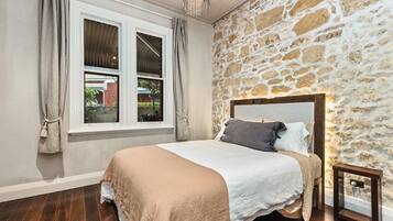 2 slaapkamers, een strijkplank/strijkijzer, gratis wifi, beddengoed