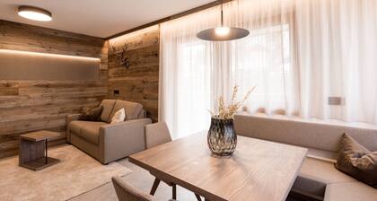 Ferienwohnung 'Obergasserhof Hüttengaudi' mit Bergblick, Gemeinschaftsgarten und WLAN