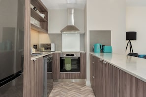 Design Apartment | Private kitchen | Fridge, microwave, oven, stovetop