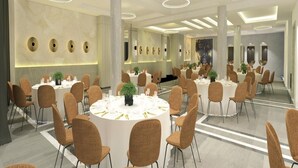 A spacious conference room with round tables and chairs, large pillars, and a modern ceiling design. - Robyson Residency Kinshasa (Kinshasa)