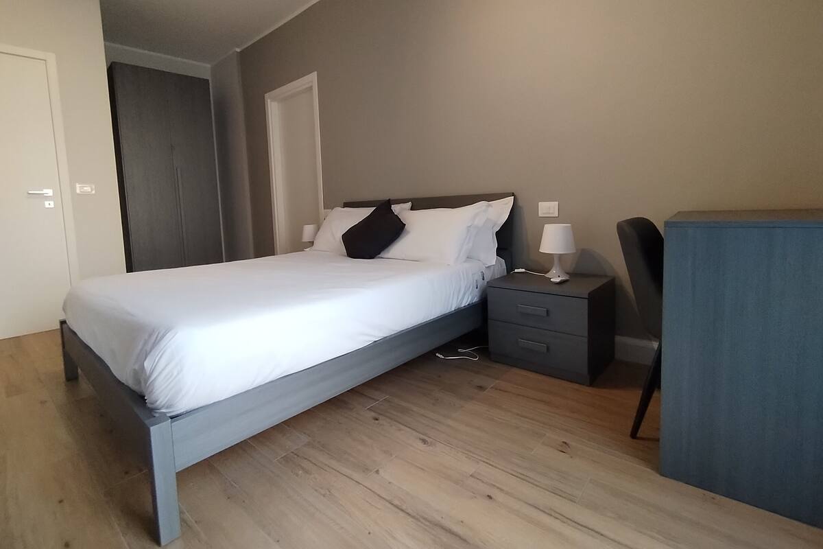 Premium bedding, down duvets, memory-foam beds, desk