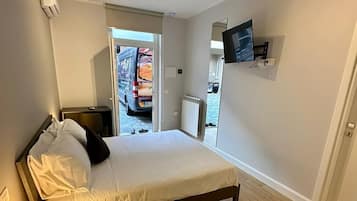 Standard Room | Premium bedding, down duvets, memory-foam beds, desk