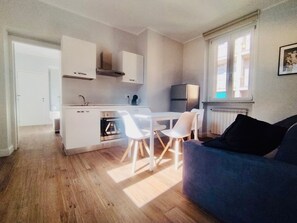 Leilighet – city, 1 soverom | Eget kjøkken | Rengjøringsutstyr