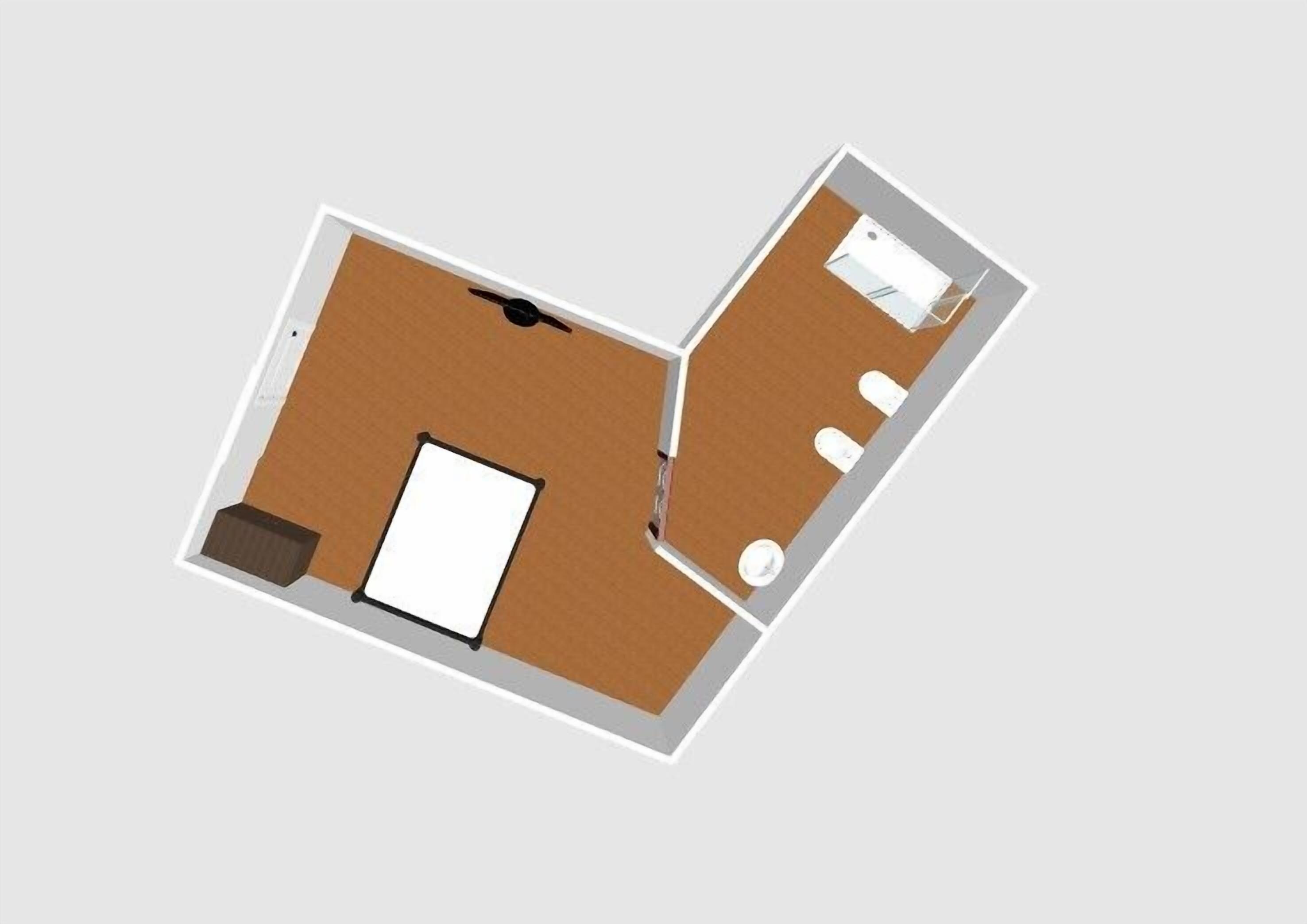 A floor plan with a bedroom, bathroom, and a small kitchen area.