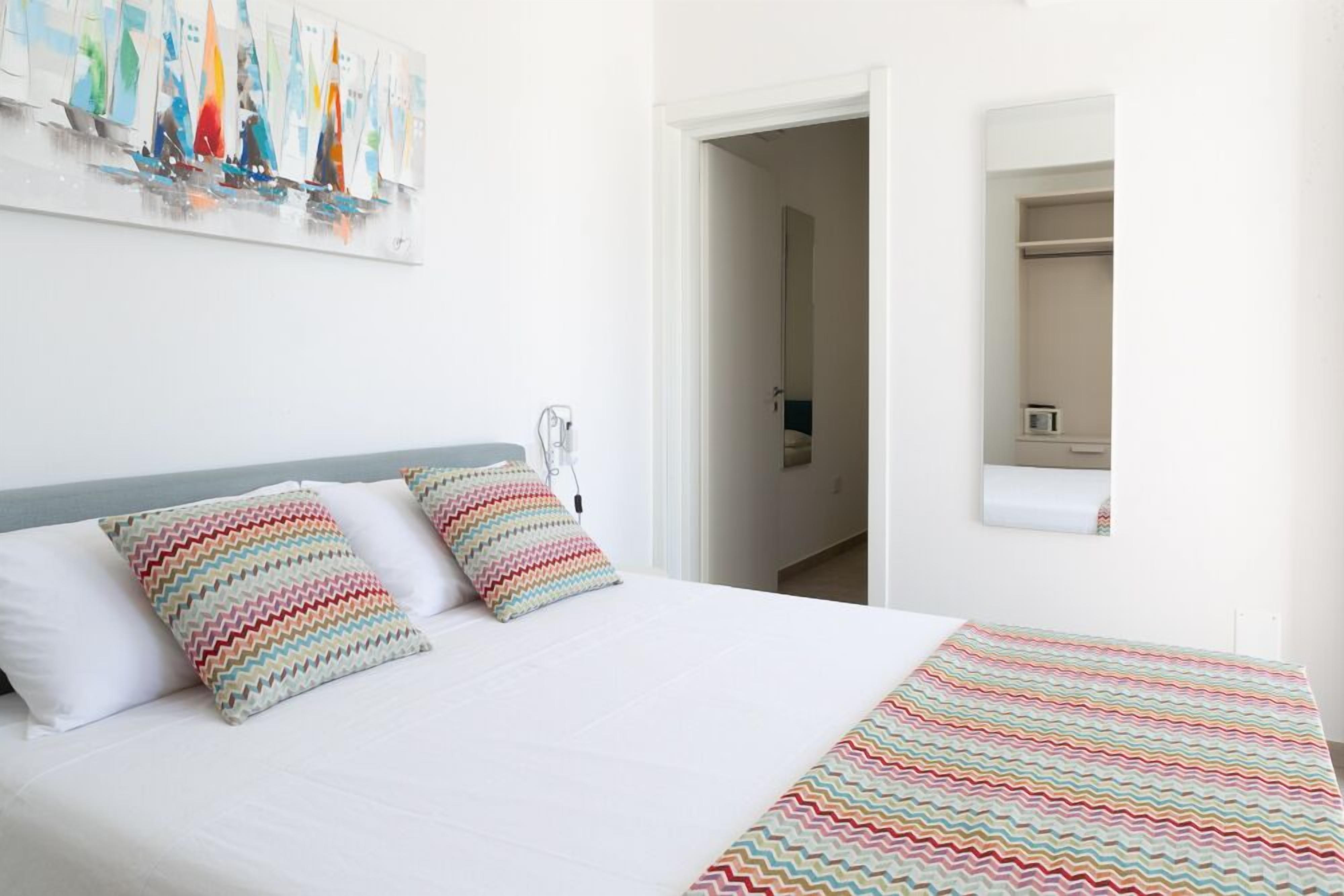 Family Quadruple Room | Premium bedding, memory foam beds, in-room safe, individually decorated