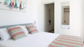 Family Quadruple Room | Premium bedding, memory foam beds, in-room safe, individually decorated