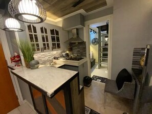 Fridge, microwave, stovetop, coffee/tea maker