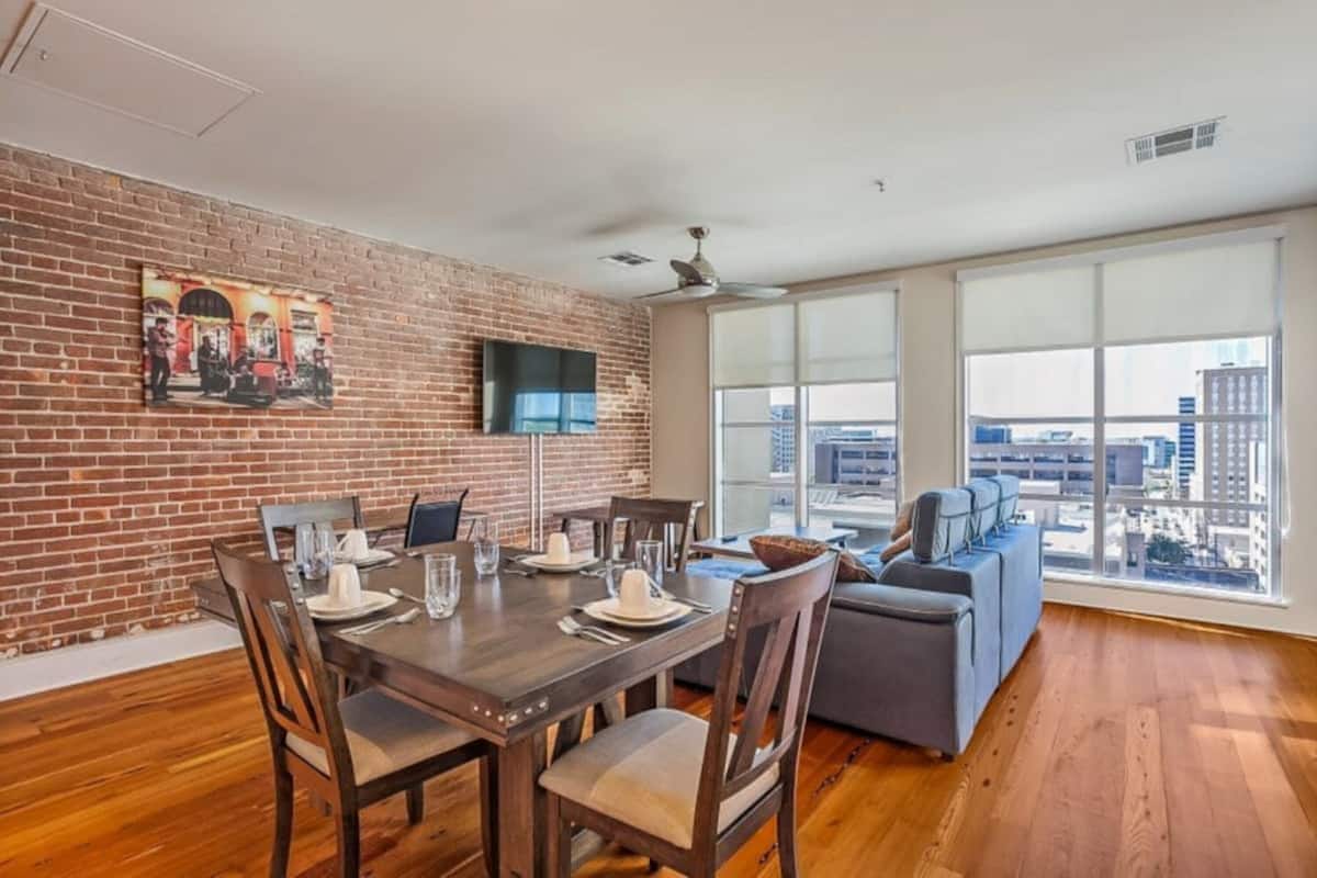 Premium Condo, 1 Queen Bed with Sofa bed | Living room | 65-inch Smart TV with digital channels, foosball