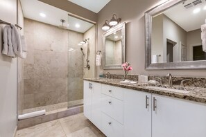 Shower, free toiletries, hair dryer, towels -  Upscale Condos and Penthouses Close to Canal & Bourbon St. (New Orleans)