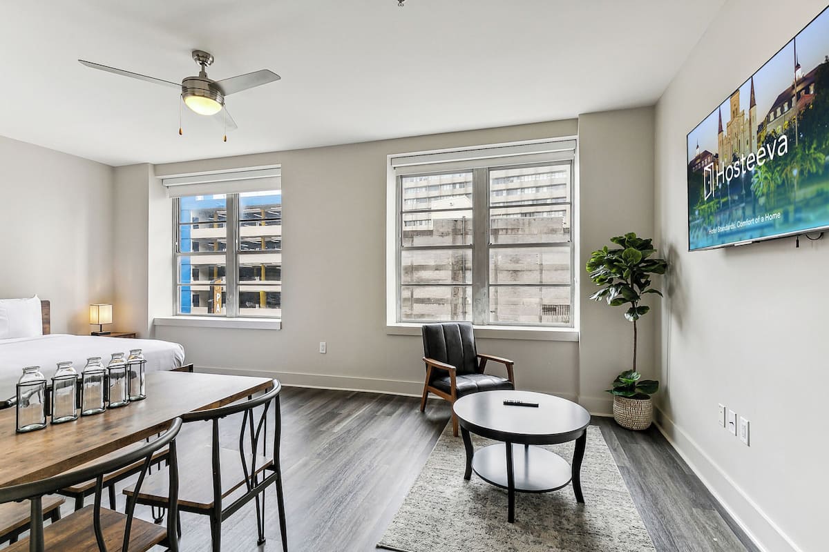 Signature Studio, 1 Queen Bed | Living room | 65-inch Smart TV with digital channels, foosball